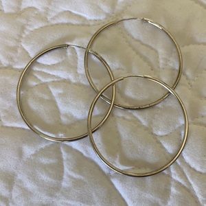 2 inch sterling silver hoops. Have an extra that I will throw in